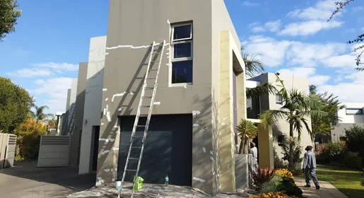 Exterior painters working on a residential property